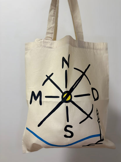 Bolsa Nómadas 24/7 negra con logo, versátil para el día a día